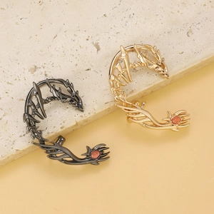 Punk style dragon ear cuff with red zircon details in gold and gun black finish