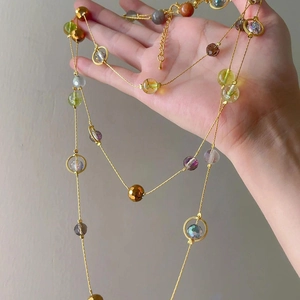Ethnic vintage style long necklace with colorful stone crystal beads and golden chain