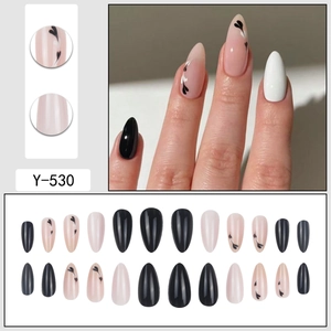 Press-on nails set with black heart patterns in almond shape, 24 piece almond stiletto kit