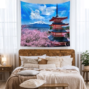 Detail of Mt Fuji tapestry showing cherry blossoms and pagoda in bedroom decor