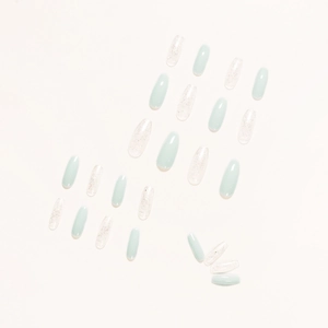 Translucent ice blue press-on nails with silver glitter in oval shape 24pcs set