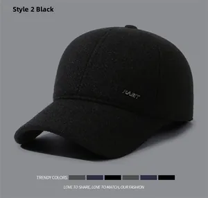 Detail of black winter baseball cap showing thick wool fabric and RABIT metal logo