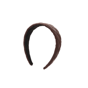 Elegant dark brown quilted faux leather headband with a classic diamond lattice pattern
