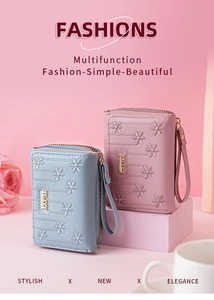 Short PU leather wallets in blue and pink with flower embroidery and wrist straps