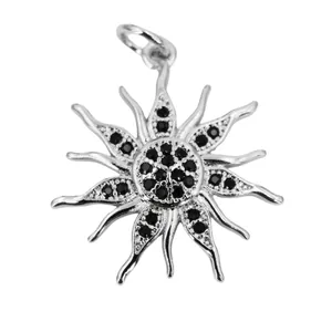 Detail of sunflower pendant with black zircon micro-pave setting on silver base