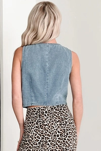 Back view of light blue denim vest for women featuring a sleeveless slim-fit cut