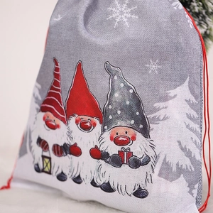 Grey Christmas gnome drawstring gift bag with snowflake and pine tree prints