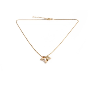 Gold star pendant necklace with colorful zircons and delicate chain on white background