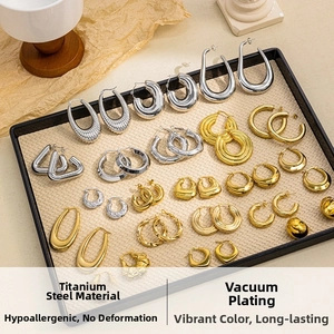 Vacuum plated titanium steel earrings in gold and silver showing anti-allergy features