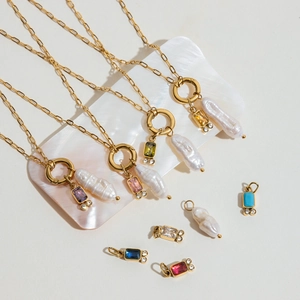 Golden necklace set with baroque pearl and colorful rectangle gemstone pendants