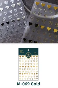 Detailed macro view of golden embossed heart pattern nail art stickers model M-069