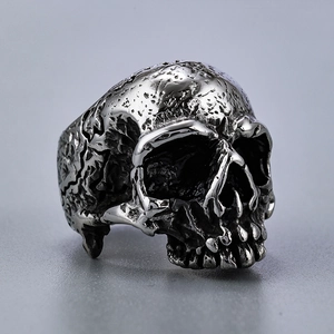 Vintage punk skull ring in silver stainless steel with gothic distressed metal details