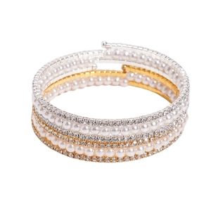 Multilayer wrap bracelet with faux pearls and rhinestones on a clean white background