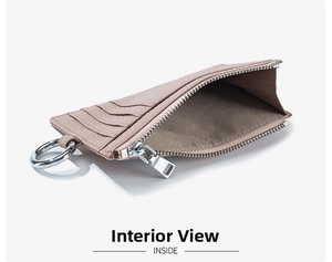 Detailed interior of the pebbled leather coin purse with silver zipper and dark lining