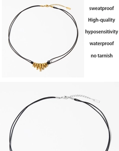 Macro detail of high-quality spikes necklace with secure lobster clasp and extension chain