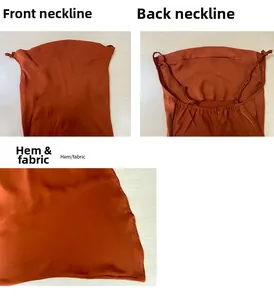 Detail view of rust red satin dress featuring V-neckline, thin straps and back zipper