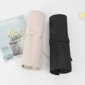 Portable lychee-grain PU leather makeup brush roll-up bag in beige and black colors
