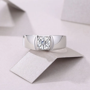 Macro shot of men's S925 sterling silver ring with a round cut lab diamond setting