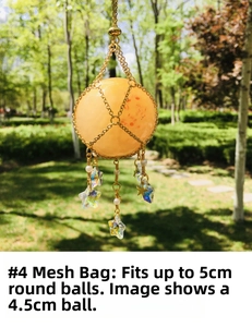 Detailed view of #4 gold woven net pouch pendant holding a 4.5cm yellow crystal ball