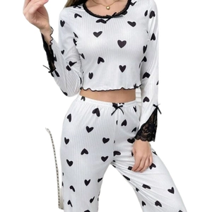 Women's white ribbed long-sleeved pajamas set with black heart print and lace trim