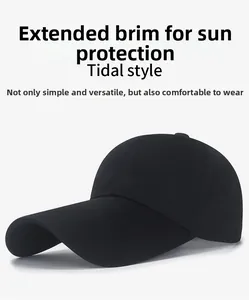 Detail of a black cotton baseball cap featuring an extra-long 14cm curved sun visor