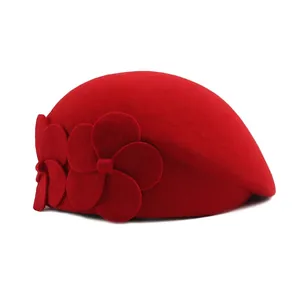 Elegant red wool beret with side flower decoration for women in minimalist style