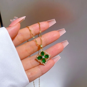 Luxurious 18K gold-plated necklace with emerald zircon flower pendant and micro-pave crystals