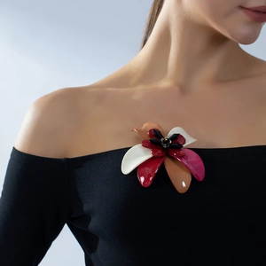 Elegant oversized layered floral acrylic brooch with colorful petals on black clothing