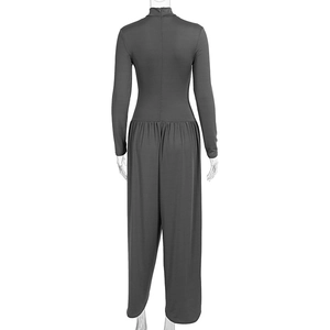 Back view of a grey long-sleeve jumpsuit featuring high neck and wide-leg trousers