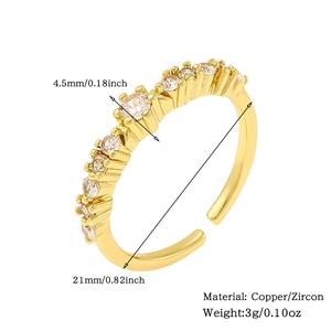 Detail view of 18K gold plated ring with zircon stones, 4.5mm width and 21mm diameter