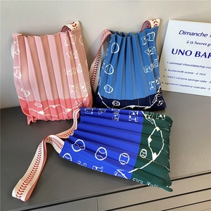 Three gradient pleated knit tote bags with baseball motifs and letter embroidery designs