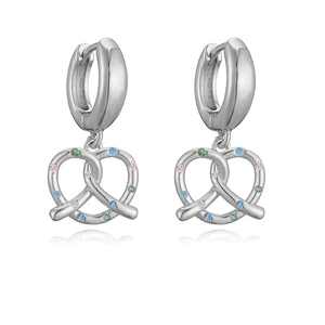 Detailed macro view of silver pretzel earrings with multi-color zircon stones