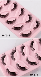 Detail view of fox-style false eyelashes models HY5-3 and HY5-4 in 5-pair packs