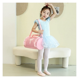 Pink ballet dance bag for girls with lace ruffles and silhouette print detail
