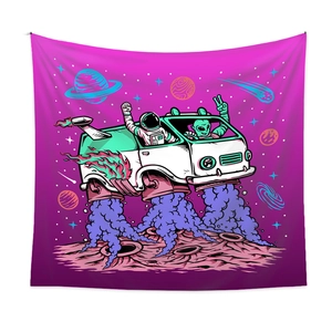 Close-up of decorative tapestry featuring an astronaut and alien in a psychedelic van