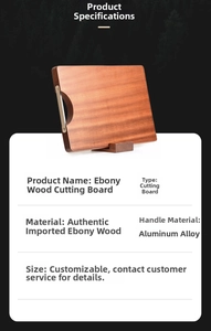 Detail view of the ebony wood cutting board showing its grain and aluminum alloy handle