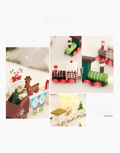 Detail of hand-painted wooden Christmas train with festive reindeer and tree patterns