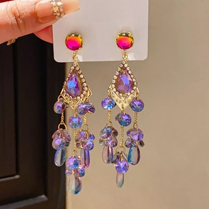 Macro shot of long crystal tassel earrings with S925 silver needles and colorful glow