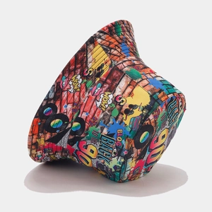 Detail of street graffiti bucket hat featuring 90s vintage patterns and cotton canvas texture
