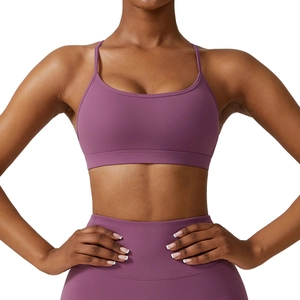 Women's purple yoga sports bra and high-waist leggings set with slim straps