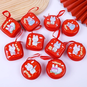 Red cartoon rabbit tinplate coin purses with zipper and hand strap on festive background