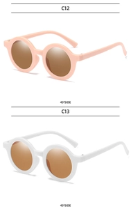 Macro side view of vintage round kids sunglasses in matte pink and white C12 C13 colors