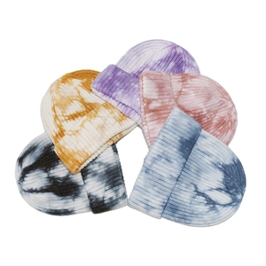 Women's gradient tie-dye knit beanie in multiple colors with ribbed cuff design