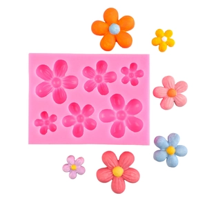 Detailed pink silicone mold with six lotus flower cavities for DIY cake fondant and crafts