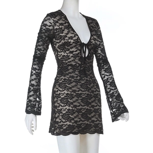 Detail of black floral lace mini dress with deep V-neck, lace-up ties, and bell sleeves