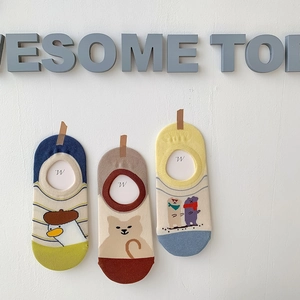 Detailed view of low-cut invisible socks featuring cute cat, duck, and bear illustrations