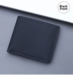 Front view of black canvas bifold wallet with reinforced stitching for men