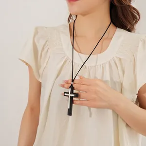 Retro black wood and silver double cross pendant necklace with a leather cord strap