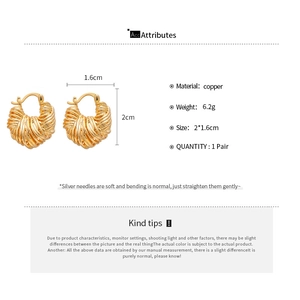 Close-up of gold-plated U-shaped hoop earrings with woven texture and size specs