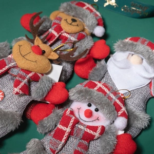 Set of 4 Christmas plush ornaments featuring Santa, Snowman, Reindeer, and Bear dolls